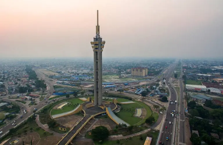 Aerial view of Kinshasa at dusk, with the Limete interchange tower